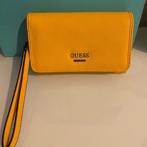 Like new yellow Guess wristlet